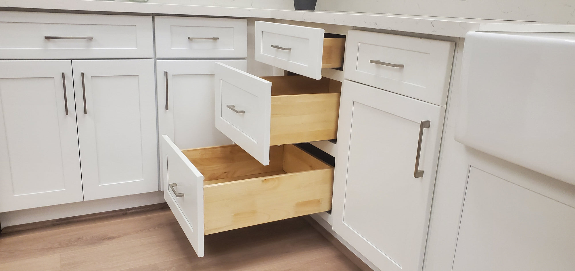 https://rtawholesalers.com/cdn/shop/files/Base-Cabinets-Pull-Out-Drawers_2a86fec2-d7af-4421-b913-acf64515bc8d_2000x.jpg?v=1684342987