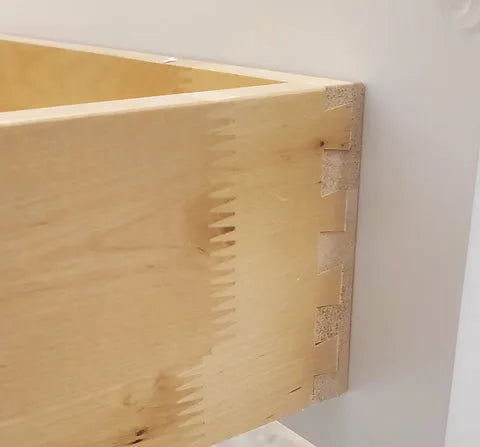 9) Install drawer. Pull out the smaller part of the glide that exits the cabinet towards the front. Both sides.Place the drawer onto the extended glides. You will then extend the glide rail towards the clip to lock in. Lock down both sides.   