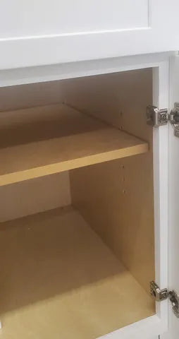 10) Install the doors onto the cabinet.Use the short screws to secure hinge onto the door. Using a long screw will go through the front finish - you do not want to do this.