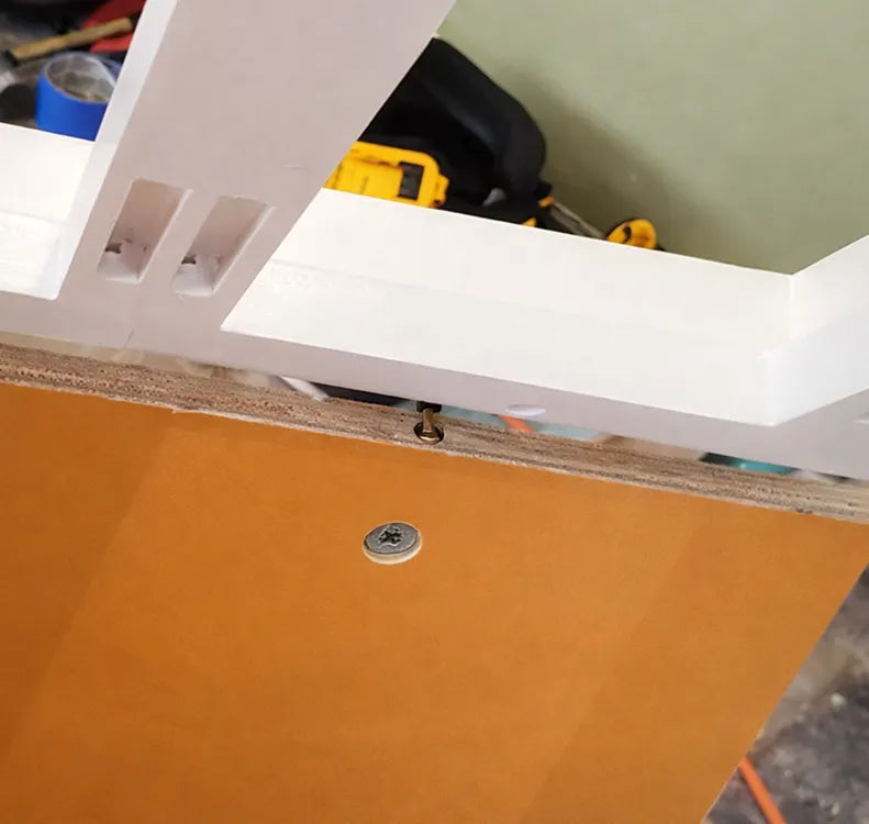 Face frame cam screws into cabinet